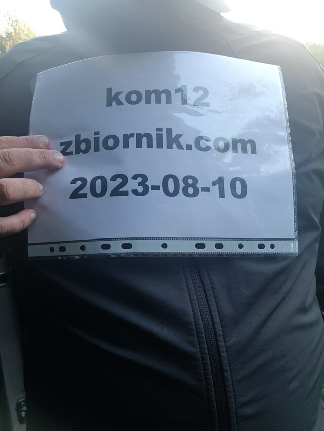kom12